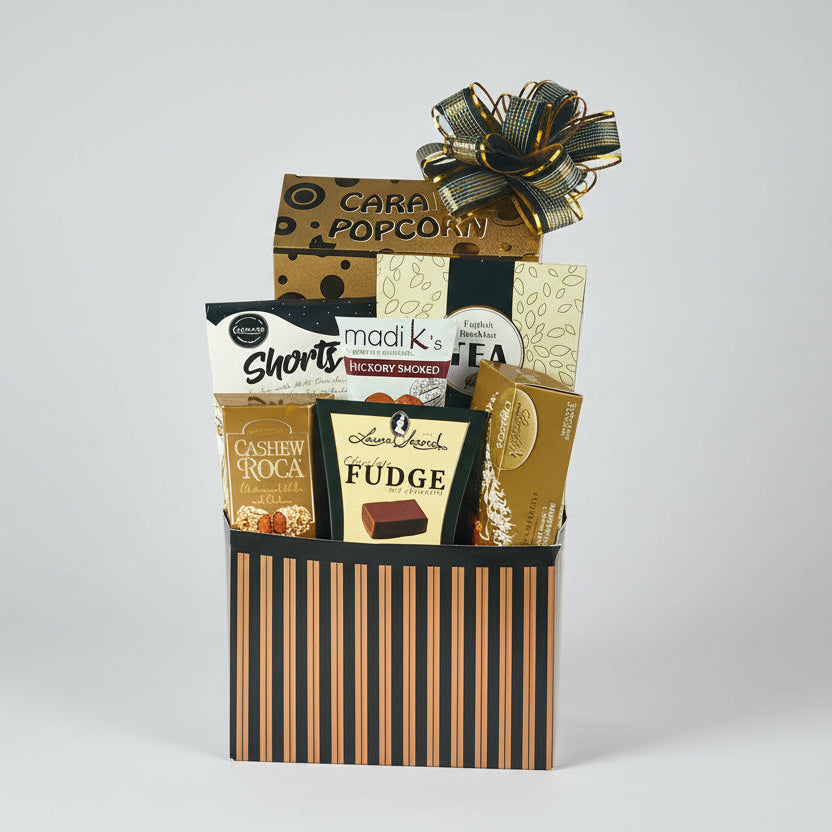 Gift basket with various snacks and treats on a wooden surface