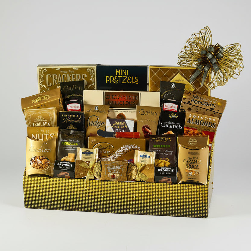 Gourmet gift basket with various snacks and treats on a white background